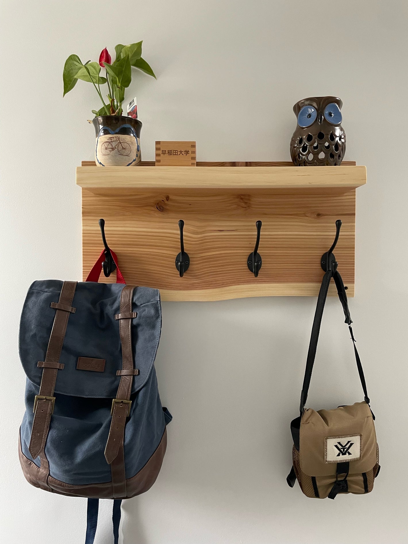 Custom live edge cedar coat rack made in Vancouver by Tundra Designs. 