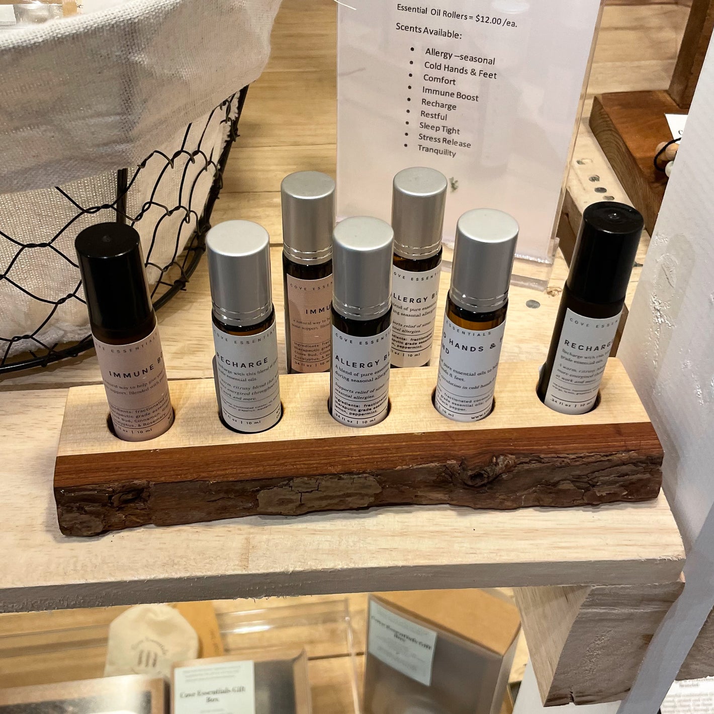 Custom live edge essential oil display for retail store by Tundra Designs.
