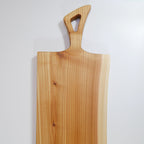 Live Edge Cedar charcuterie board by Tundra Designs, a small business based in Vancouver, Canada